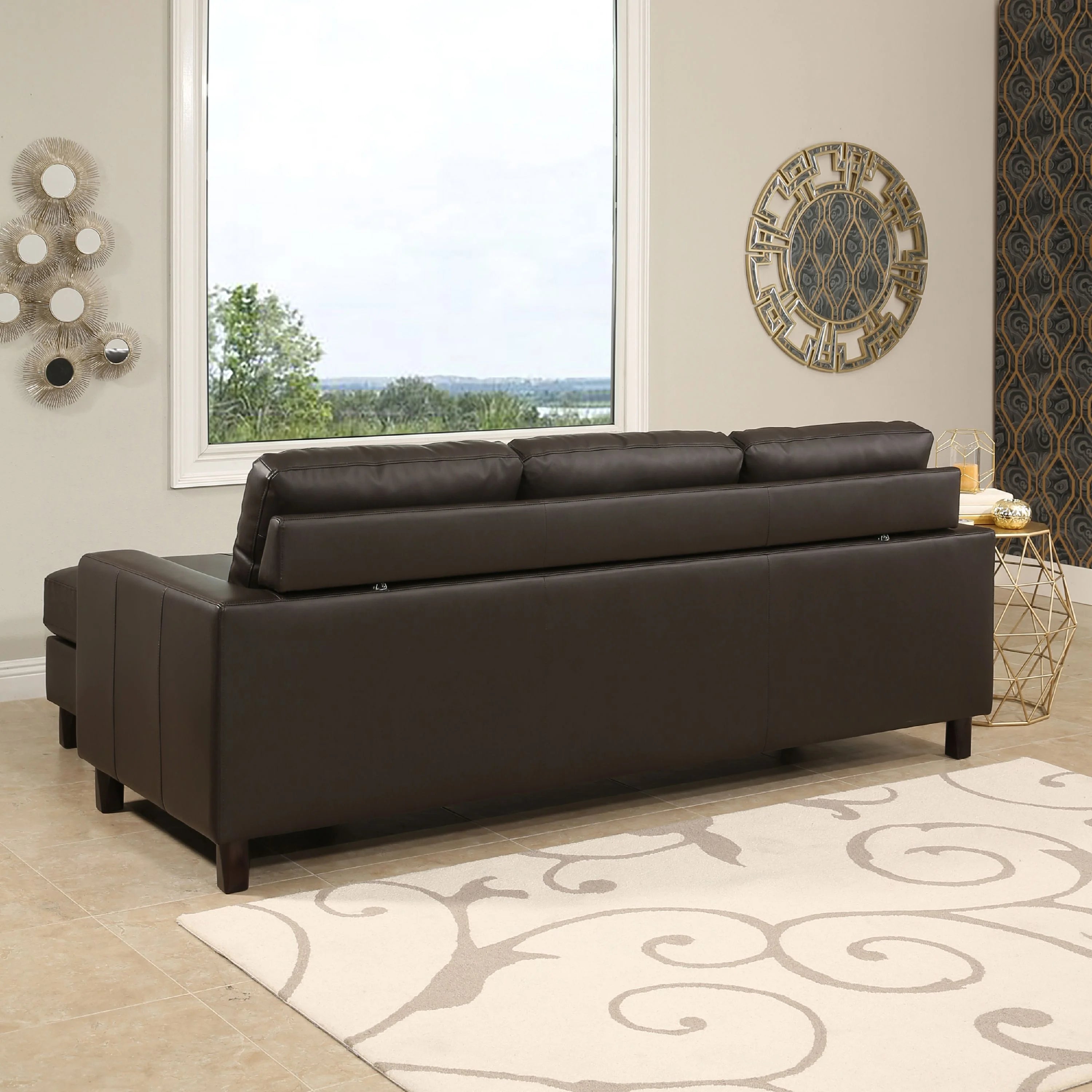 Brown Leather Reversible Sectional and Ottoman Y257